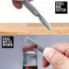 "Pocket-Sized Survival Tool – Folding Knife, Bottle Opener, Hiking Clip & Phone Stand"